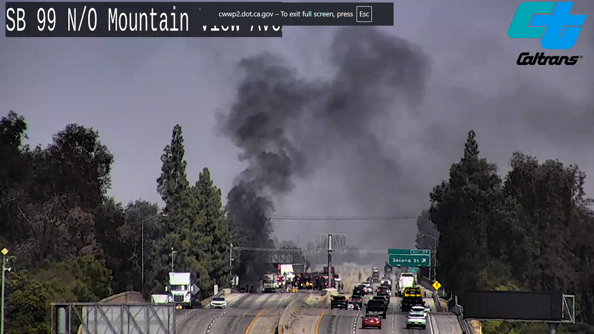 A fuel tanker carrying 8,600 gallons caught fire after a crash with a box truck on southbound Highway 99 at Second Street on Saturday, Aug. 8. 2026, in Selma, California.